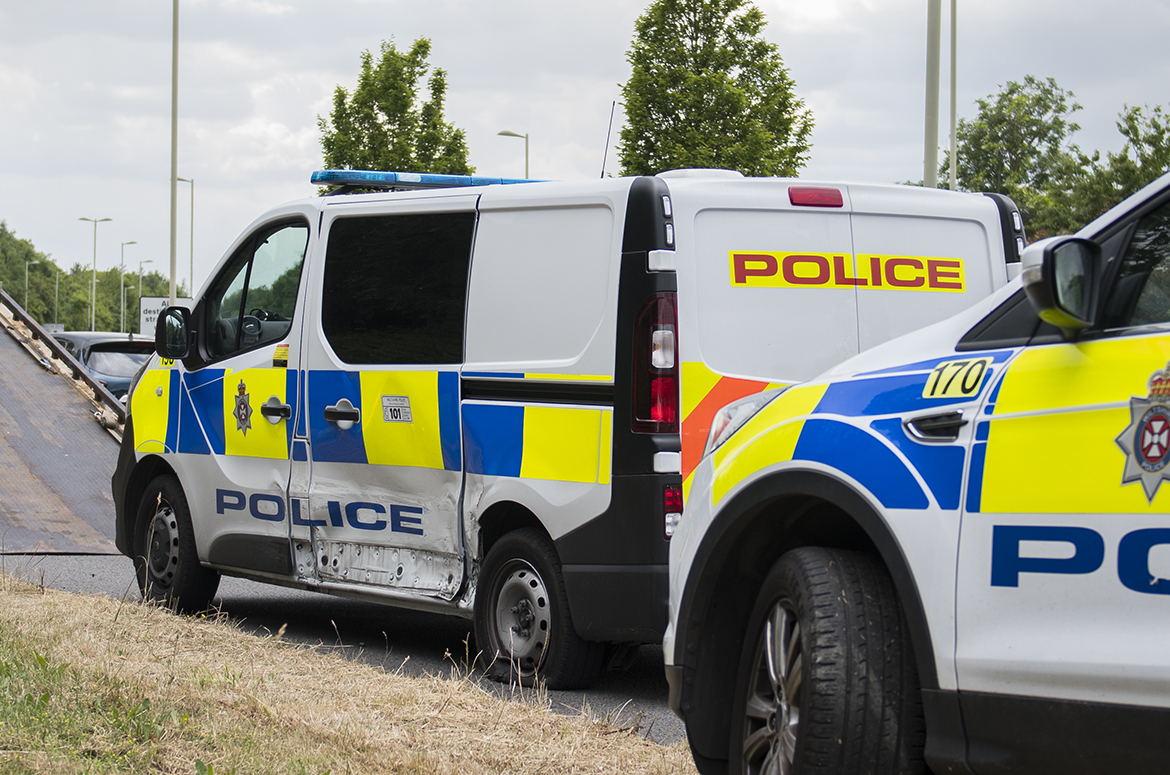 Police vehicle and car involved in crash on Thamesdown Drive in Swindon