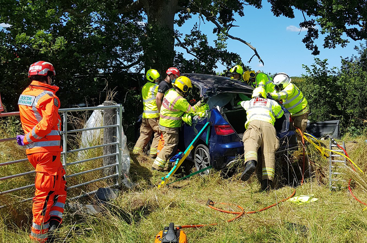 Road closed after woman suffers suspected serious injuries in A338