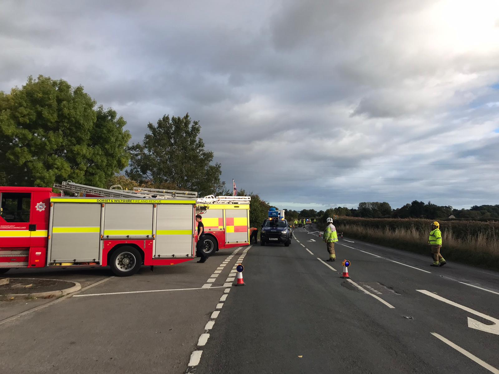 Fire crews and police called after power cable falls into road near ...